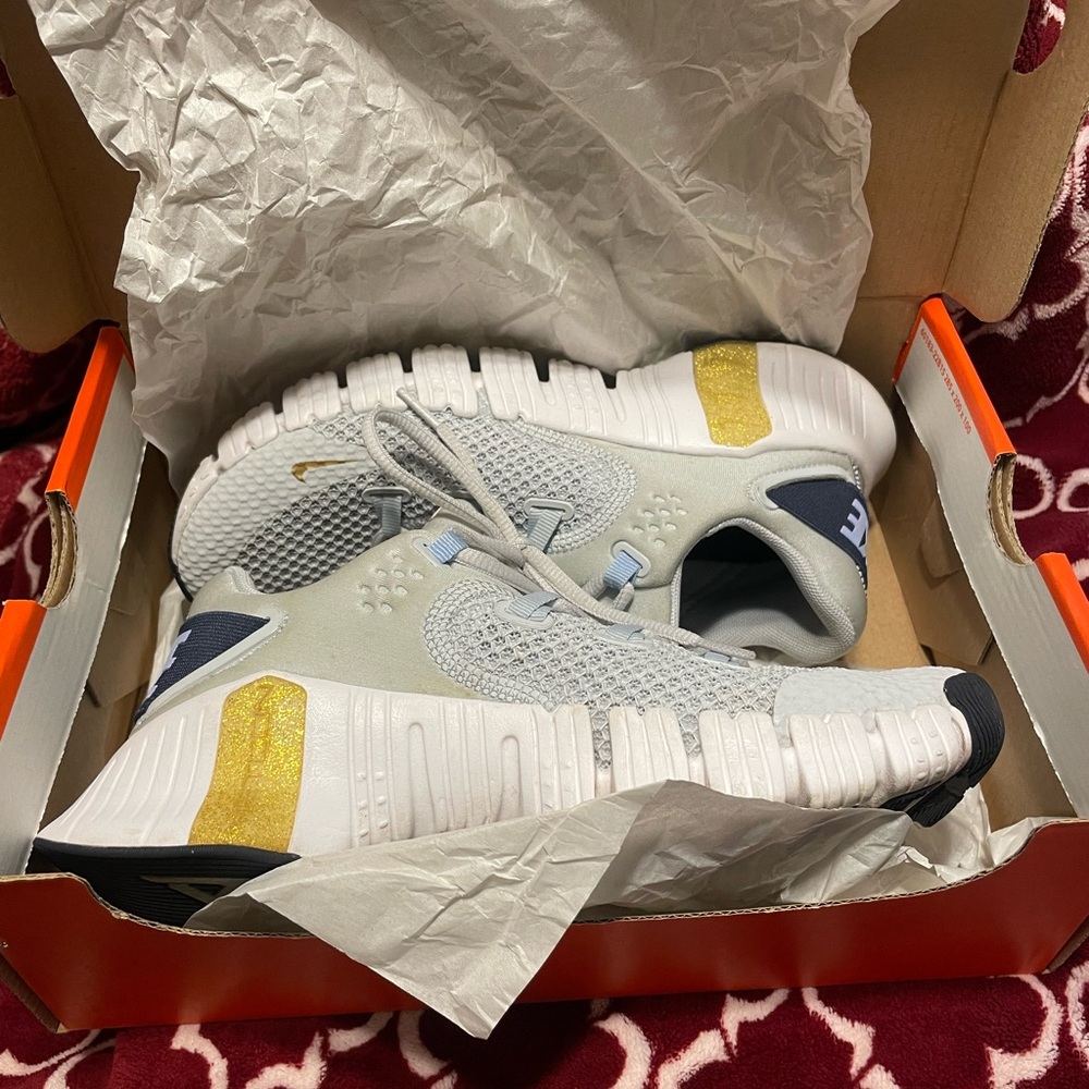 Nike Women Metcom 4  with Gold and Blue Highlights